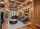 Elegant office space with custom wood paneling, built-in bookshelves, and ample natural light at 5 Mockingbird Ln, Cherry Hills Village, CO 80113