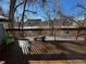 Spacious back deck with railing and a nice view at 1469 S Ulster St, Denver, CO 80231