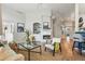 Sunlit living room with a fireplace, vaulted ceilings, and stylish decor at 3930 Miller St, Wheat Ridge, CO 80033