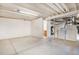 Unfinished basement area offering laundry, storage, and potential for customization at 523 E Long Ct, Littleton, CO 80122