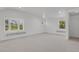 Spacious bedroom with large windows providing ample natural light at 440 Balsam St, Lakewood, CO 80226