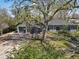 Charming single-story home with a large, mature tree in the front yard offering plenty of shade at 440 Balsam St, Lakewood, CO 80226