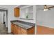 Granite countertops provide extra space for a breakfast bar or additional cooking prep room at 440 Balsam St, Lakewood, CO 80226