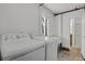 Laundry room with a washing machine, dryer, and utility sink at 440 Balsam St, Lakewood, CO 80226