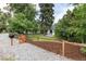 Charming home with new wooden fence and gravel driveway at 9393 W 14Th Ave, Lakewood, CO 80215