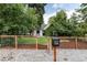 Updated craftsman home behind a new wooden fence at 9393 W 14Th Ave, Lakewood, CO 80215