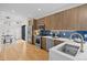 Modern kitchen with stainless steel appliances, stylish cabinetry, and hardwood floors at 1747 Lowell Blvd, Denver, CO 80204