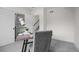 Office space featuring a large window, closet and view to stairs at 1747 Lowell Blvd, Denver, CO 80204