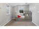 Cozy bedroom featuring gray walls and themed decor at 1051 Independence St, Lakewood, CO 80215