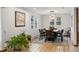 Bright dining room featuring a chandelier and space for a full dining set at 1051 Independence St, Lakewood, CO 80215
