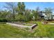 Spacious backyard with a garden and beds, offering a peaceful outdoor space for gardening and recreation at 1051 Independence St, Lakewood, CO 80215