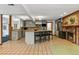Spacious kitchen with center island, granite countertops, and stainless steel appliances at 1051 Independence St, Lakewood, CO 80215