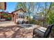 Charming patio with outdoor seating and views of the beautifully landscaped backyard at 1051 Independence St, Lakewood, CO 80215