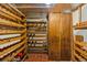 Well-organized wine cellar with wooden racks and storage at 1051 Independence St, Lakewood, CO 80215