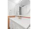 Bathroom featuring white cabinetry, modern mirror, and clean, bright space and vanity at 800 Washington St # 302, Denver, CO 80203