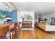 Open-concept living space with views to the kitchen, piano, and comfortable living room at 800 Washington St # 302, Denver, CO 80203