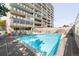 Sunny community pool with lounge seating in an upscale setting at 800 Washington St # 302, Denver, CO 80203