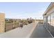 Long rooftop deck seating area with beautiful city skyline views at 800 Washington St # 302, Denver, CO 80203