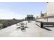 Spacious rooftop deck area with outdoor kitchen and lounge seating at 800 Washington St # 302, Denver, CO 80203