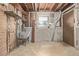 This basement features a utility sink at 1520 Phillips Dr, Northglenn, CO 80233