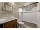 This bathroom features a shower and sink at 1520 Phillips Dr, Northglenn, CO 80233