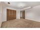 This bedroom features carpet and a closet at 1520 Phillips Dr, Northglenn, CO 80233