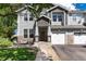 Charming townhome with a well-maintained front yard and welcoming entrance at 4797 Flower St, Wheat Ridge, CO 80033