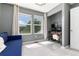 Home office with gray walls, carpet, and work station in alcove at 4797 Flower St, Wheat Ridge, CO 80033
