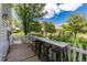 Charming patio space with bar table and seating, perfect for enjoying outdoor views and relaxation at 4797 Flower St, Wheat Ridge, CO 80033