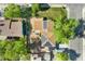 Aerial view of a property with solar panels and an outdoor lounge area at 1713 S Holland St, Lakewood, CO 80232