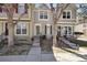 Charming townhome with a well-maintained front exterior and inviting entrance at 1811 S Quebec Way # 60, Denver, CO 80231