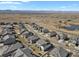 A high aerial view of the neighborhood showcasing easy access to the highway and views of the surrounding mountains at 3422 W 155Th Ave, Broomfield, CO 80023