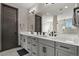 Luxurious bathroom featuring double sink vanity, quartz countertops, with a view of the shower and tub at 3422 W 155Th Ave, Broomfield, CO 80023