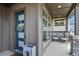 Inviting front porch with stone accents and outdoor seating, creating a welcoming entrance at 3422 W 155Th Ave, Broomfield, CO 80023