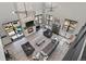 Aerial view of an open-concept living room with a fireplace and soaring ceilings and views at 3422 W 155Th Ave, Broomfield, CO 80023