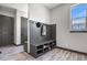 Mudroom with built-in bench seating and storage cubbies, and access to front of home at 3422 W 155Th Ave, Broomfield, CO 80023