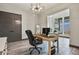 Bright office with a modern desk, ample lighting, and sophisticated gray accents at 3422 W 155Th Ave, Broomfield, CO 80023