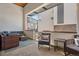 Cozy outdoor patio furnished with comfortable seating, perfect for relaxing and entertaining at 485 Interlocken Blvd # 106, Broomfield, CO 80021