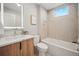 Bathroom featuring a modern vanity, bathtub, and an illuminated mirror for an enhanced ambiance at 2326 Eliot St # 7, Denver, CO 80211