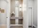 Elegant entryway with a decorative mirror, sleek console table, and contemporary lighting, offering a welcoming ambiance at 2326 Eliot St # 7, Denver, CO 80211