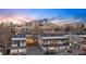 Contemporary townhomes feature rooftop decks and city views, ideal for city living at 2326 Eliot St # 7, Denver, CO 80211