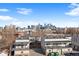 Contemporary townhomes feature rooftop decks and city views, offering modern living at 2326 Eliot St # 7, Denver, CO 80211