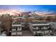 Modern townhomes featuring a rooftop deck and skyline views, offering city living at 2326 Eliot St # 7, Denver, CO 80211
