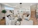 Bright living room with a contemporary design, featuring hardwood floors and an open concept layout at 2326 Eliot St # 7, Denver, CO 80211