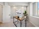Bright office space with an industrial desk, contemporary wallpaper, and plenty of natural light at 2326 Eliot St # 7, Denver, CO 80211