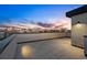 A spacious rooftop deck shows sweeping skyline views, perfect for urban living at 2326 Eliot St # 7, Denver, CO 80211