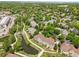 Aerial view of the neighborhood showcasing the community, walking paths, and lush landscaping at 6024 W Colorado Ln, Lakewood, CO 80232