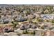 Overhead view of a quiet suburban neighborhood with mature trees and well-maintained yards at 6024 W Colorado Ln, Lakewood, CO 80232