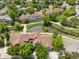 Community overview featuring a serene pond, walking trails, and well-maintained landscaping at 6024 W Colorado Ln, Lakewood, CO 80232