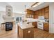Modern kitchen with wooden cabinets, ample counter space, and a cozy atmosphere at 6024 W Colorado Ln, Lakewood, CO 80232